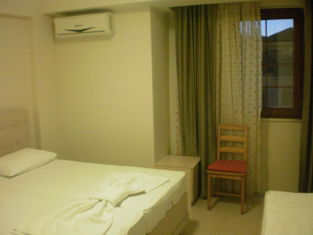 Delos Hotel Bozcaada Ruang foto